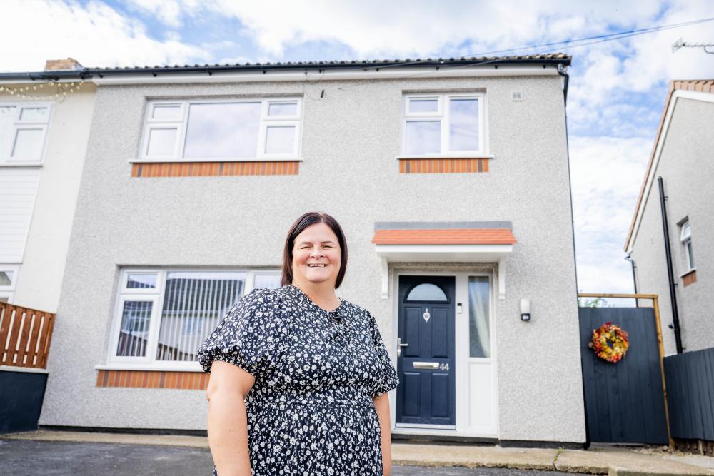 Resident Alison at her home