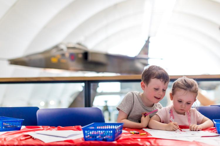 children studying raf museum 